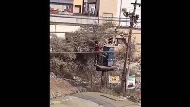 A drunk man climbs on a transformer in Telangana