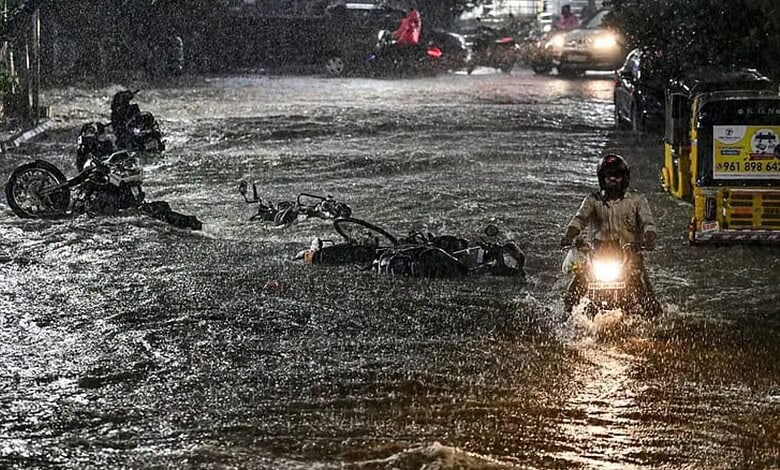 Street flooded with rainwater in Hyderabad amid unseasonal weather and hailstorms.