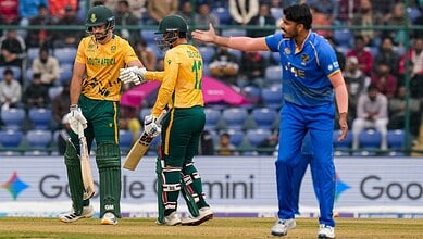 South African cricket players celebrating after winning against UAE in T20 World Cup.