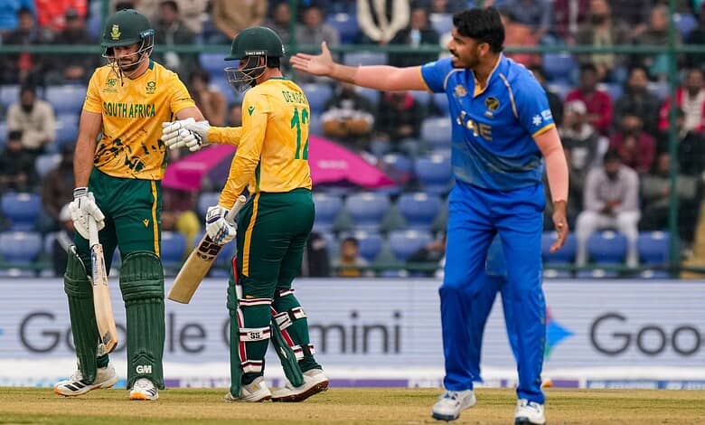 South African cricket players celebrating after winning against UAE in T20 World Cup.