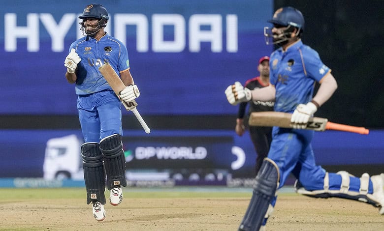 UAE cricket players celebrating after winning a tense T20 World Cup match against Canada.