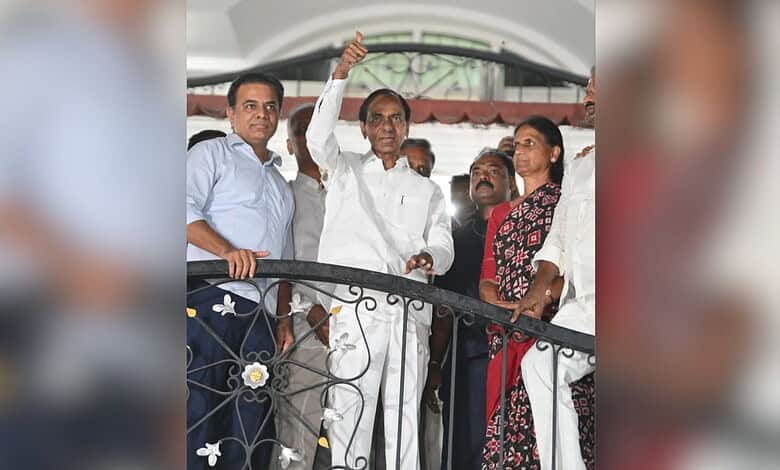 BRS supremo and former chief minister KCR waves to his supporters after the five-hour questioning by the SIT in the phone tapping case. He is flanked by his son and Working President KTR and former education minister Sabitha Reddy