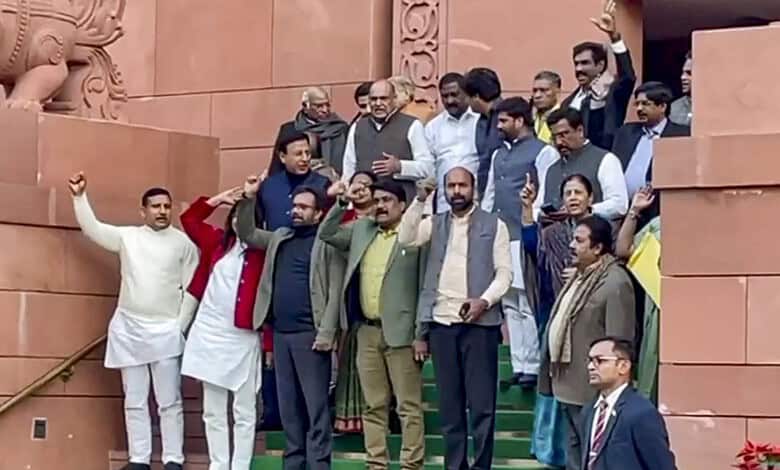 Opposition MPs raise slogans after staging a walkout from the Rajya Sabha during Prime Minister Narendra Modi reply to the Motion of Thanks to the President's address at the Budget session of Parliament on Thursday. (PTI Photo)(PTI02_05_2026_000263B)