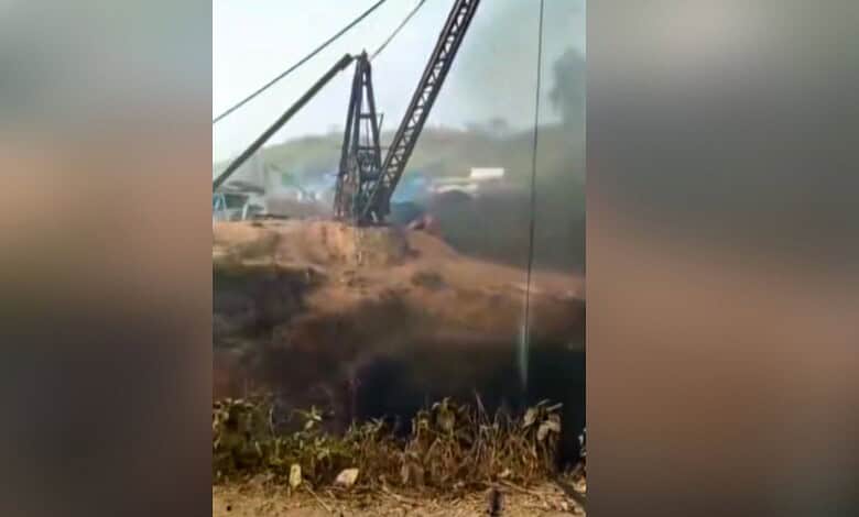 Smoke billows after an explosion at an illegal coal mine, in East Jaintia Hills district, Meghalaya, Thursday, Feb. 5, 2026. At least 18 workers were killed and several others are feared trapped. (PTI Photo)