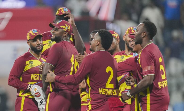 West Indies' players celebrate after winning an ICC Men's T20 World Cup 2026 cricket match between England and West Indies at the Wankhede Stadium in Mumbai on Wednesday. (PTI Photo/Kunal Patil)