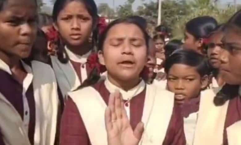 Group of students protesting water shortage at government school in Telangana.