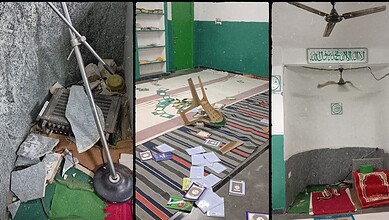 Messy mosque with scattered Qurans and prayer mats on the floor.