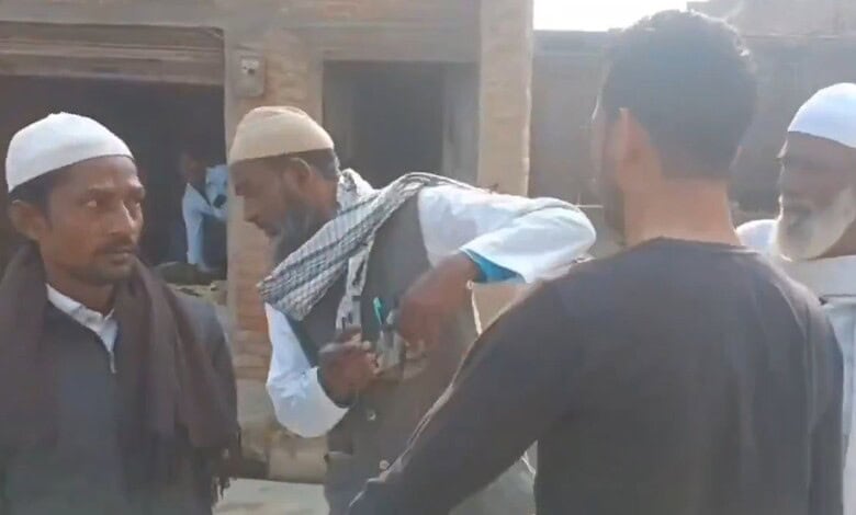 Group of men discussing an incident related to hate crime in Uttar Pradesh, India.