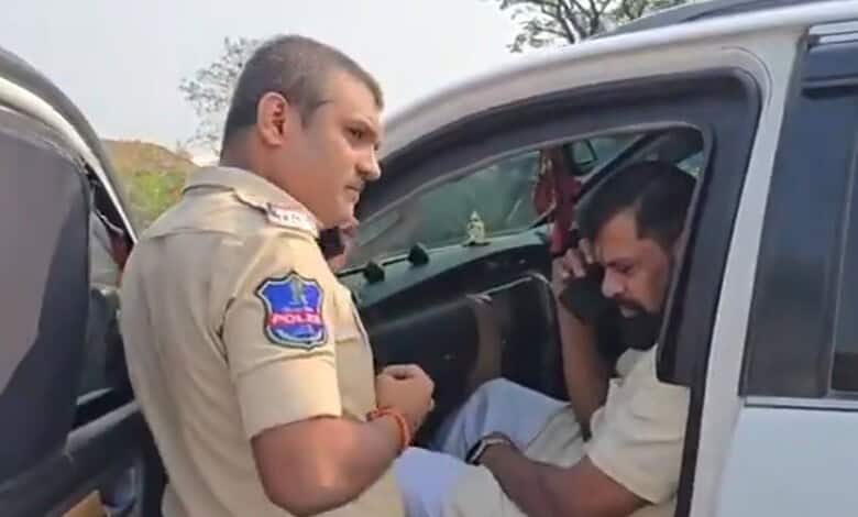 Police detain Raja Singh during Bajrang Dal protest after RTC bus damage in Medak.