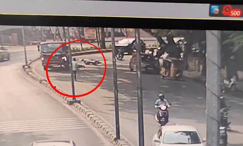 Accident scene in Hyderabad's Banjara Hills with vehicles and pedestrians after a road mishap.