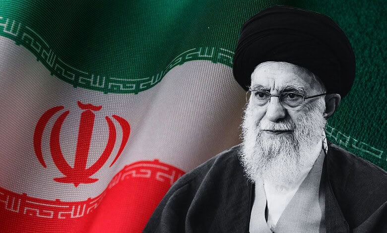 Ayatollah Khamenei, Iran's Supreme Leader, pictured with national flag during a public appearance.