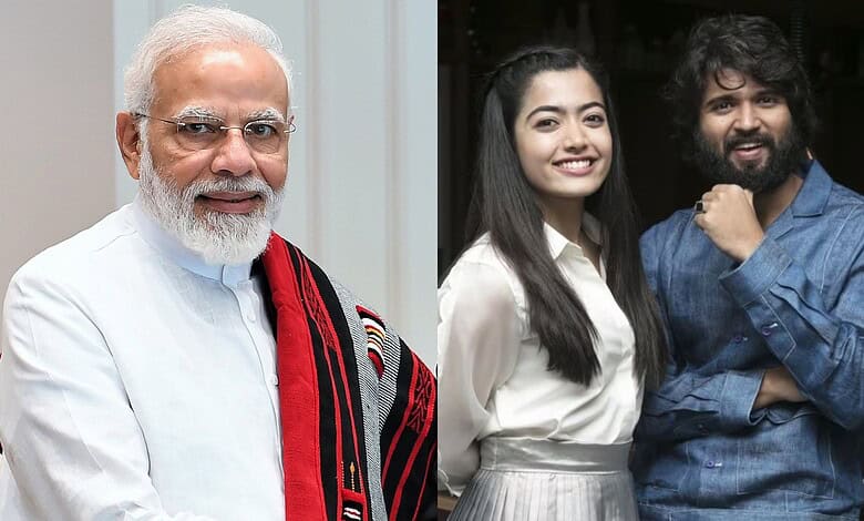 Narendra Modi with two young professionals smiling at an event, promoting innovation and leadership.