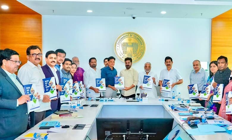 Group of officials at Telangana Education Board discussing education reforms.