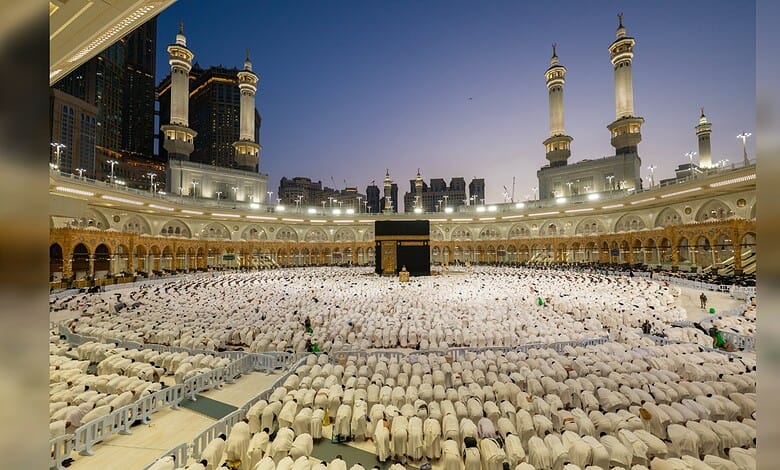 Thousands of pilgrims performing Umrah at Masjid al-Haram during Ramzan, with a large crowd gathered.