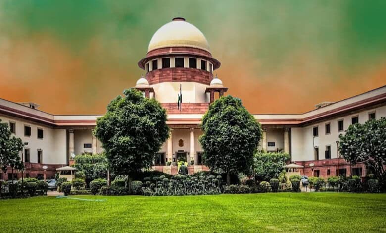 Supreme Court of India with lush greenery in front, symbolising justice and authority.