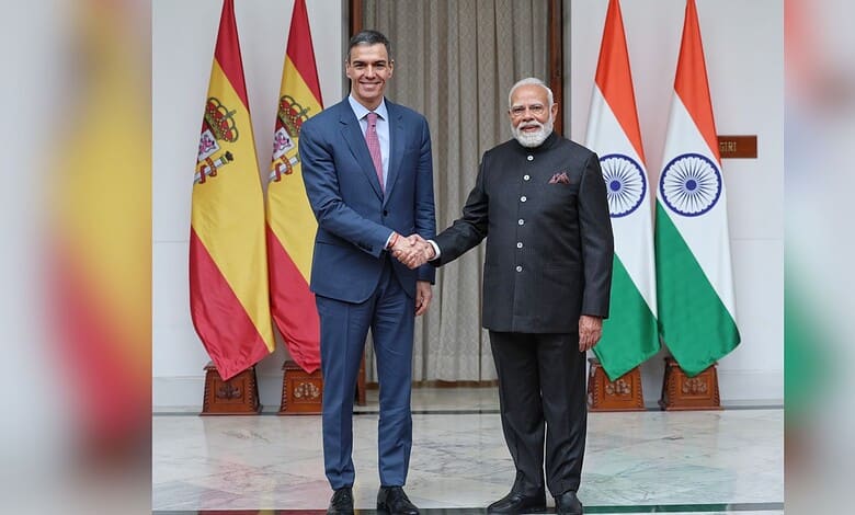 Prime Minister Modi and Spanish President Sanchez shake hands during AI collaboration talks.