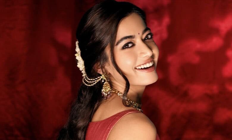 Rashmika Mandanna smiling in traditional attire, confirming her wedding news.