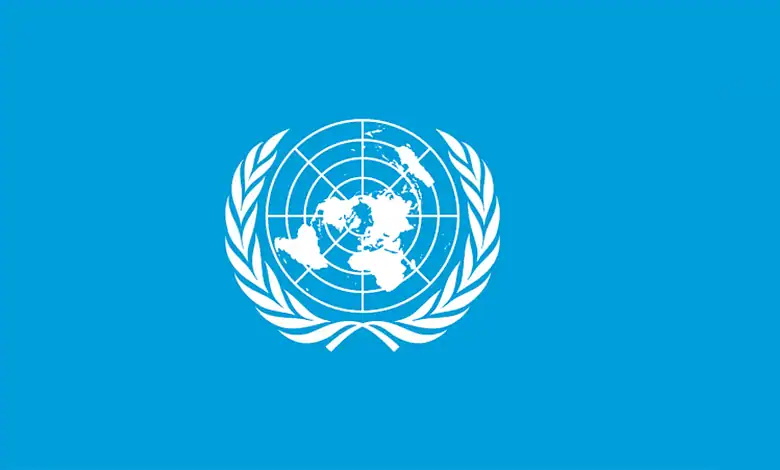 United Nations emblem on a blue background.