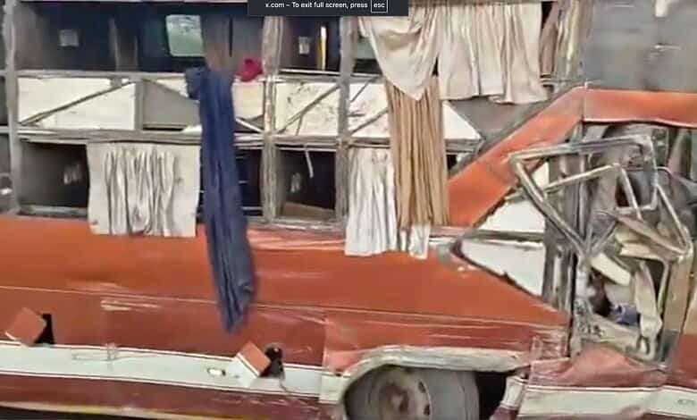 Overturned bus from Hyderabad after accident in Nizamabad.