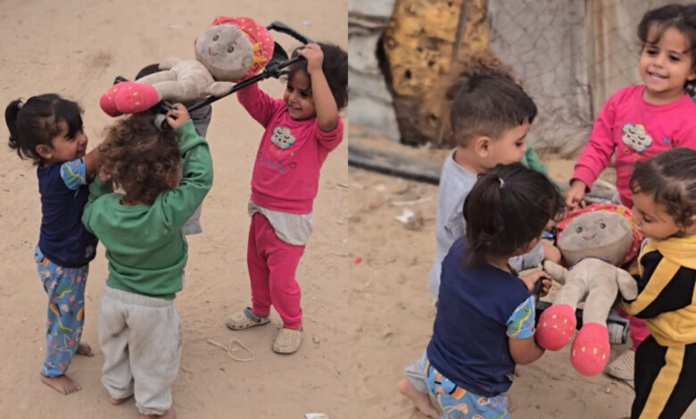Children in Gaza act out a funeral scene while they play with dolls