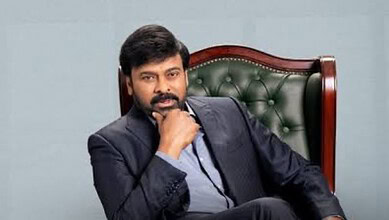 Chiranjeevi at award ceremony, receiving NTR garu honour, celebrating achievement.