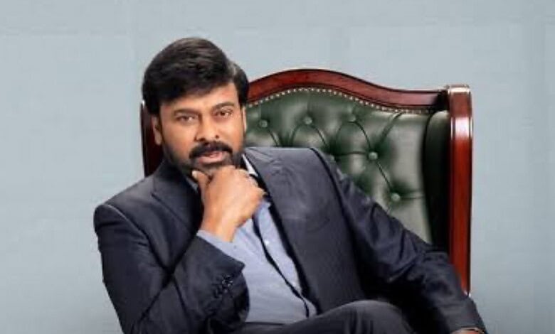 Chiranjeevi at award ceremony, receiving NTR garu honour, celebrating achievement.