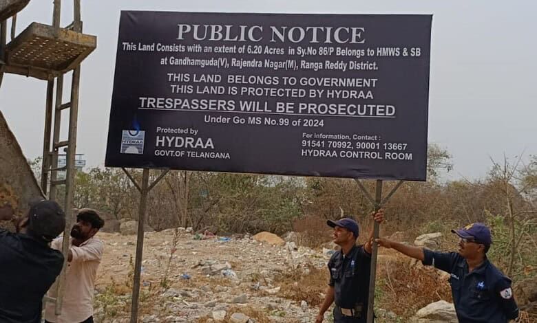 The image shows HYDRAA officials fencing 6.3 acre government land worth Rs 600 crore in Hyderabad's IT Corridor in Gandipet mandal of Rangareddy district on Monday, March 2, 2026.