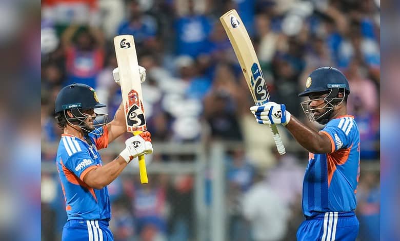 Sanju Samson celebrates his half century with Ishan Kishan during the ICC Men's T20 World Cup 2026 second semifinal cricket match between India and England at the Wankhede Stadium in Mumbai on Thursday, March 5.