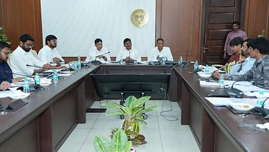 Telangana officials discuss housing policy in a formal meeting.