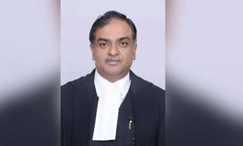 Indian judge in formal robes speaking about AI's role in legal training and judicial discipline.