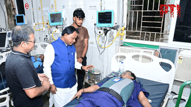 Odisha CM Mohan Charan Majhi interacts with a patient