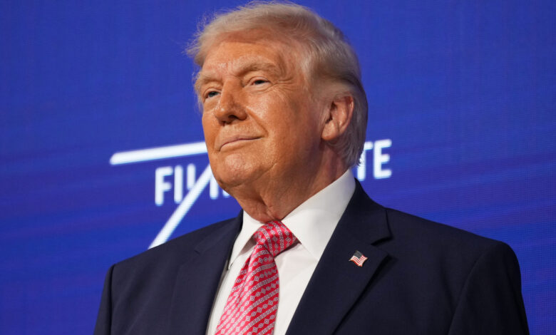 President Donald Trump takes the stage at the Future Investment Initiative Institute's summit, Friday, March 27, 2026, in Miami Beach, Fla