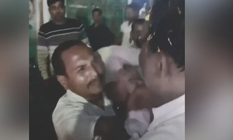 Clash between individuals during a viral non-veg photo incident at Kanpur temple, causing chaos and mob v.