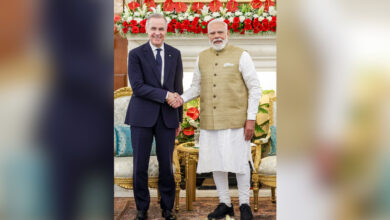 Prime Minister Narendra Modi, right, exchanges a hand-shake with Canadian Prime Minister Mark Carney, at Hyderabad House in New Delhi.