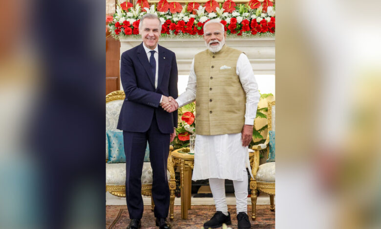 Prime Minister Narendra Modi, right, exchanges a hand-shake with Canadian Prime Minister Mark Carney, at Hyderabad House in New Delhi.