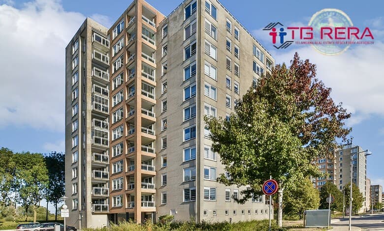 Modern multi-storey residential building with trees and clear sky in the background.