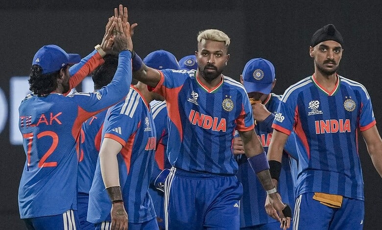 Indian cricket players celebrating during T20 World Cup match against West Indies.