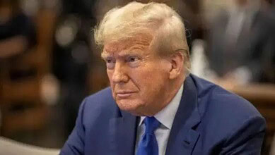US President Donald Trump addresses a meeting