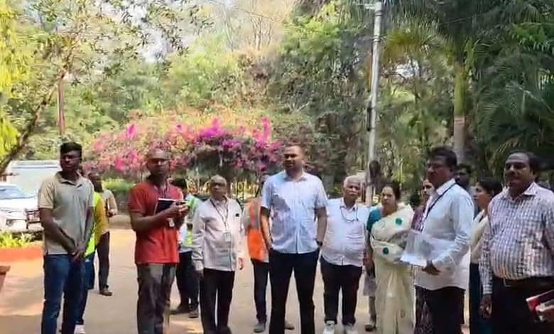 GHMC officials inspecting the play area at Indira Park in Hyderabad for cleaning and maintenance.