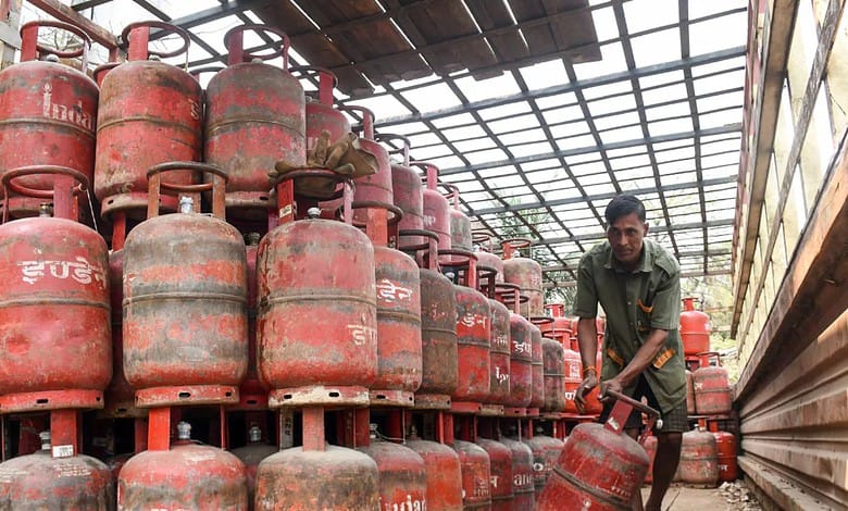 Large stock of LPG gas cylinders stored in a warehouse for distribution.