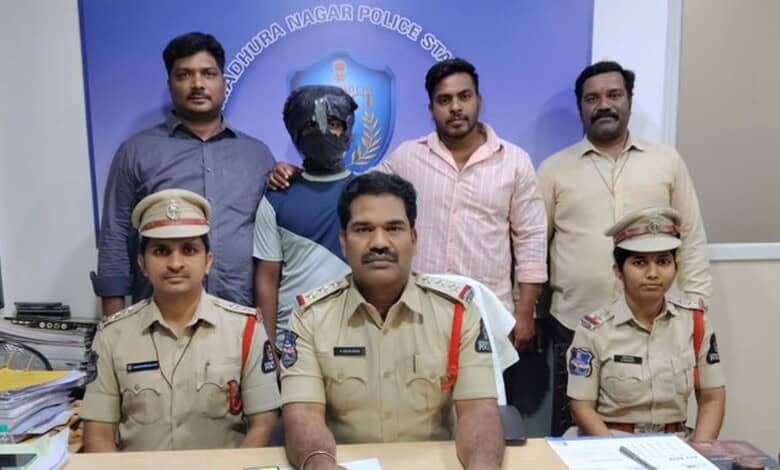 Police officers and officials at a press conference in Hyderabad.