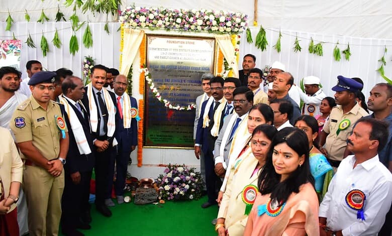 Group of officials and dignitaries at the foundation stone laying event for Sircilla court complex, Telan.
