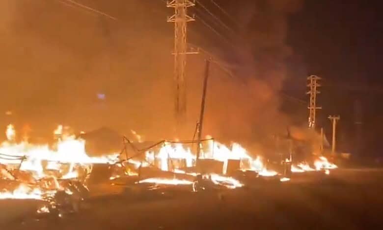 Burning high tension wires and damaged shops after fire in Bachupally, 20 shops gutted.