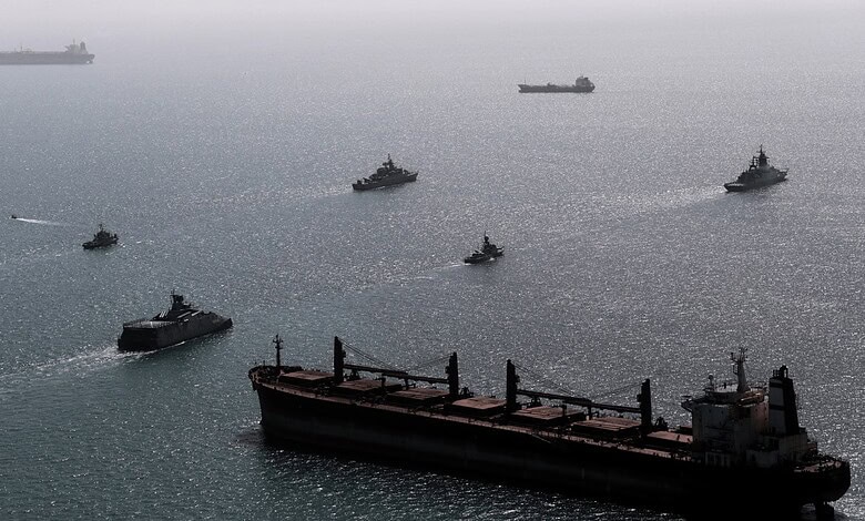 Iranian and Russian navy ships conduct a joint military drill in the Indian Ocean in an image released by the Iranian military.
