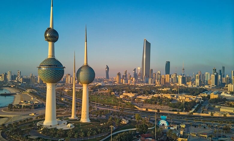 Kuwait Towers and Kuwait City skyline overlooking the Arabian Gulf.