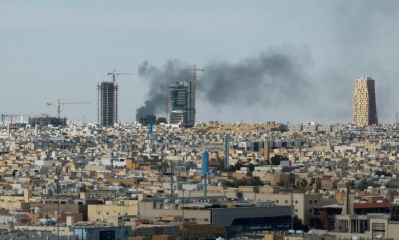 Smoke rising over Riyadh skyline during heightened tensions linked to the US-Israel conflict with Iran in Saudi Arabia.