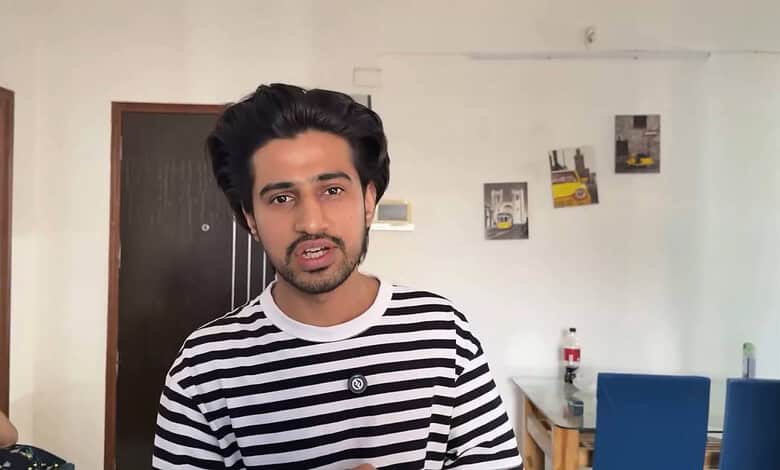E-sports player sitting in a Mumbai flat, looking concerned, highlighting issues of discrimination agains.