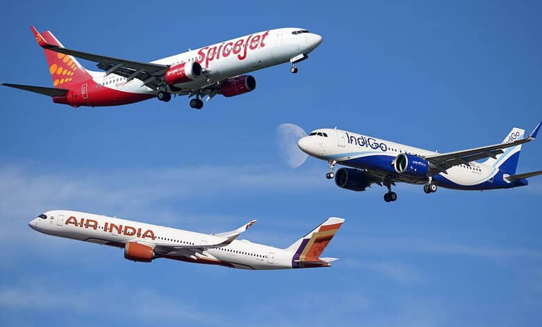 Three commercial airplanes flying in clear blue sky, representing Indian airlines facing fuel cost challe.