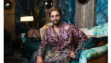 Allu Arjun attending a media event, dressed in a patterned outfit with sunglasses.
