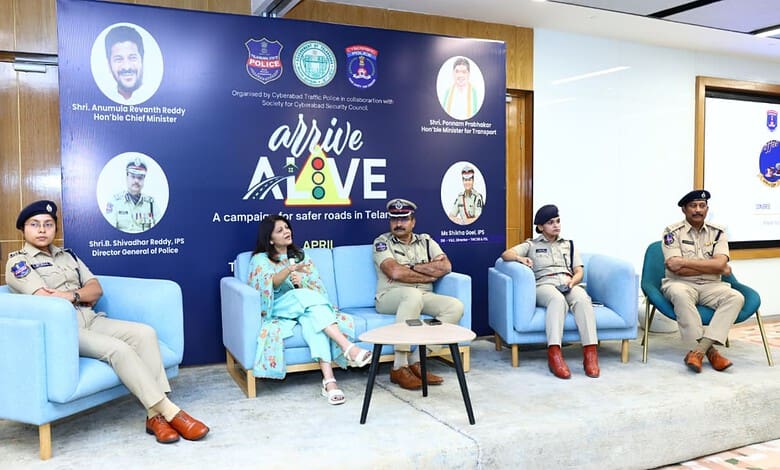 Road safety campaign in Telangana featuring police officers and community leaders discussing traffic safe.
